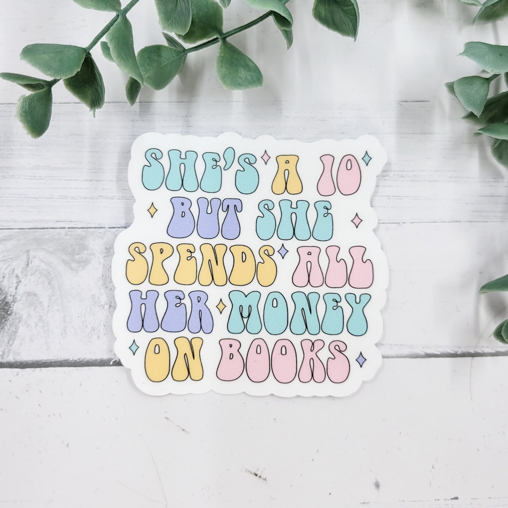 Spends All Her Money On Books - Vinyl Waterproof Sticker