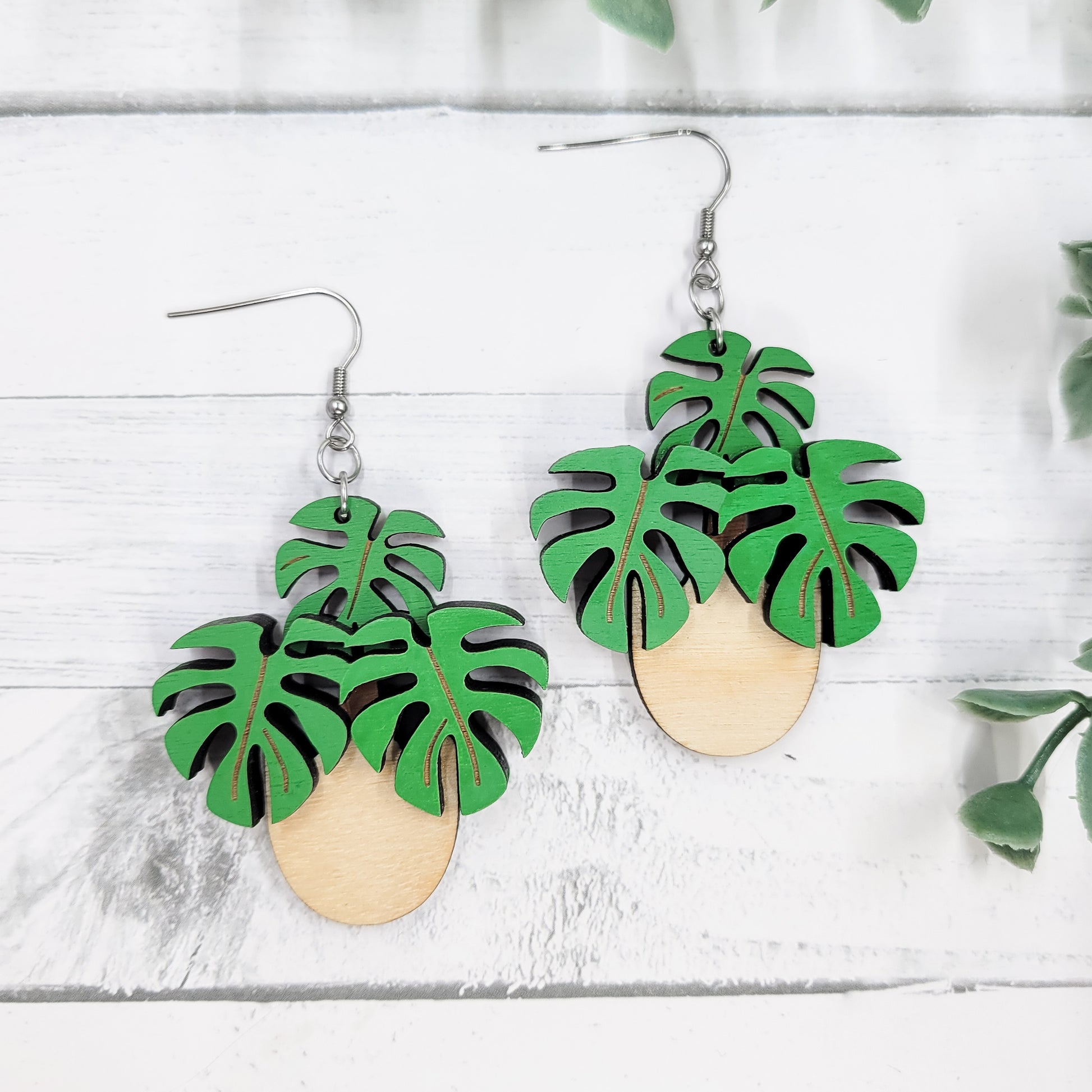 monstera plant earrings Hand Painted Potted Monstera Wooden Dangle Earrings – The Purple Chickadee